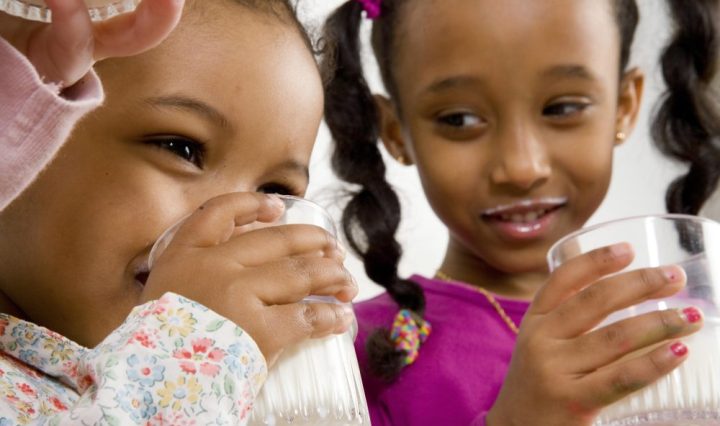 Children drinking milk TetraPak  