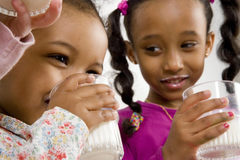 Children drinking milk TetraPak  