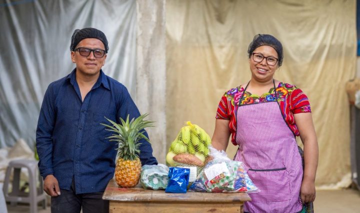Guatemala. Heydi and Alvaro bundle fresh and nutritious foods into packages