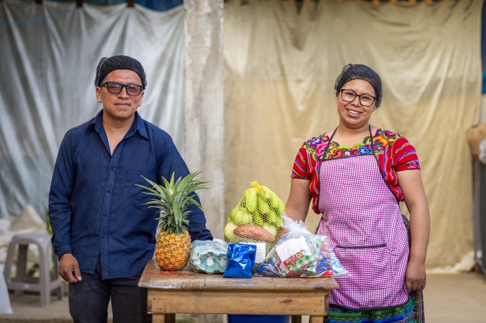 Guatemala. Heydi and Alvaro bundle fresh and nutritious foods into packages